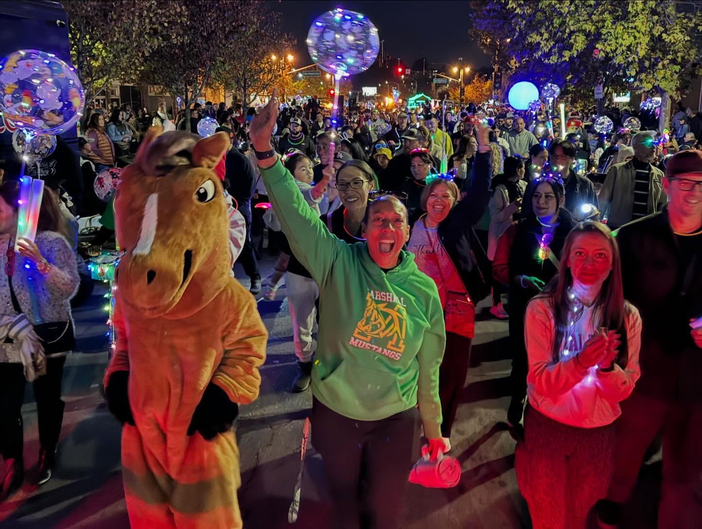 people in a crowd at night